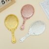 Gilded Vintage Handheld Mirror: Ornate Portable Makeup Mirror (Gold/Silver)